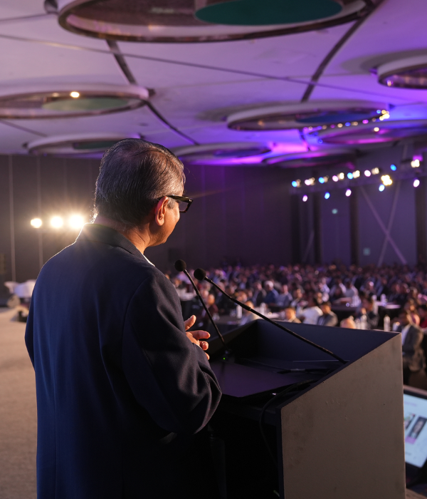 Speaker addressing the AISS audience